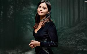 Jenna Coleman strikes a beautiful pose in a dark-green dress